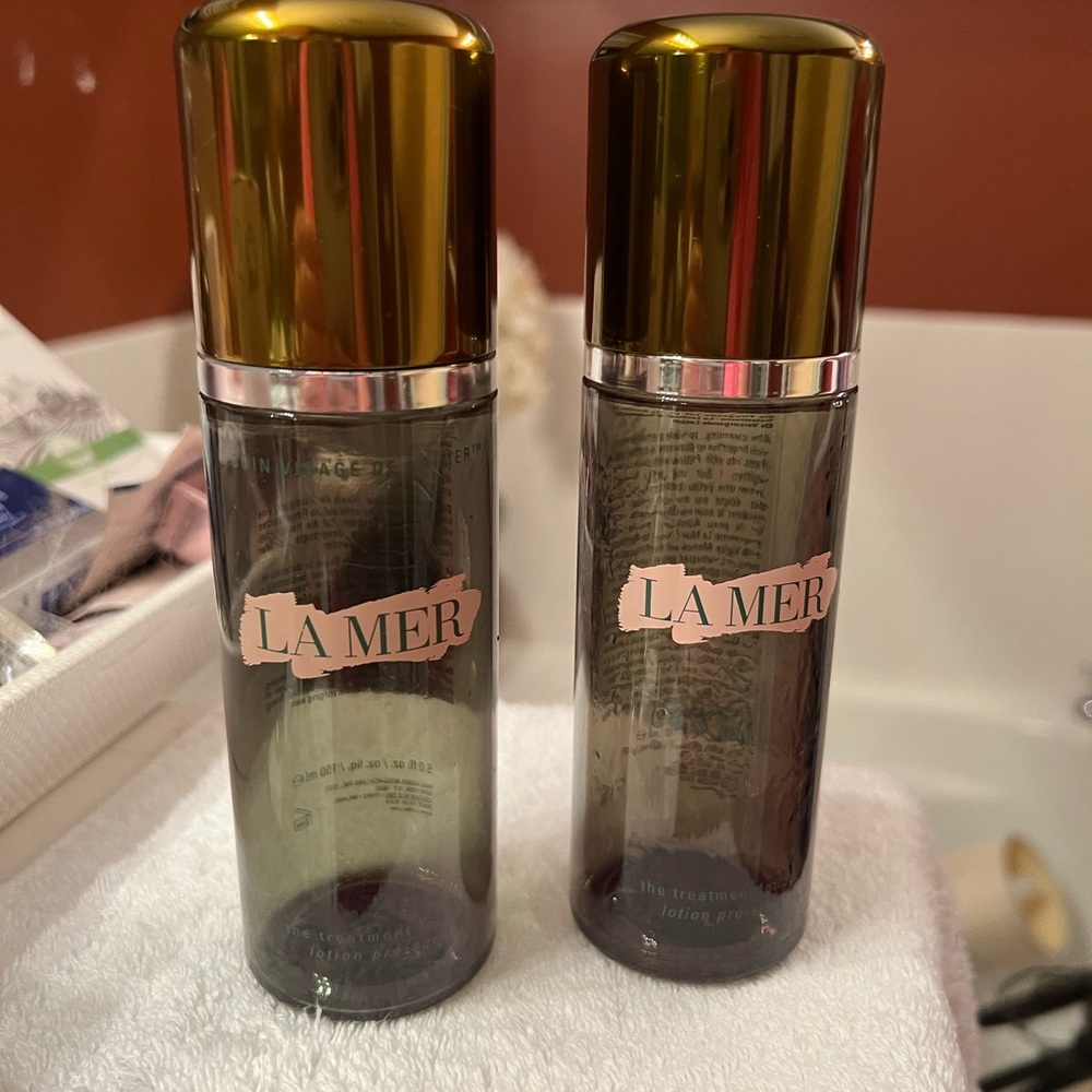 2 EMPTY bottles of La Mer The Treatment Lotion, 5onz each.